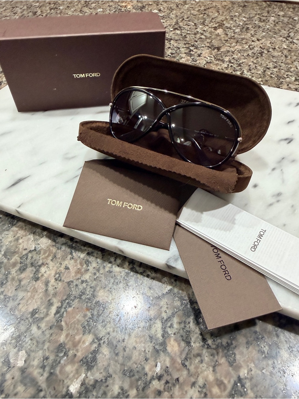 Women’s Tom Ford butterfly sunglasses.